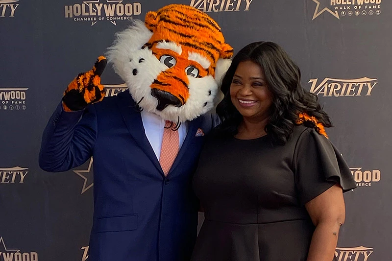 Octavia Spencer and Aubie pose together
